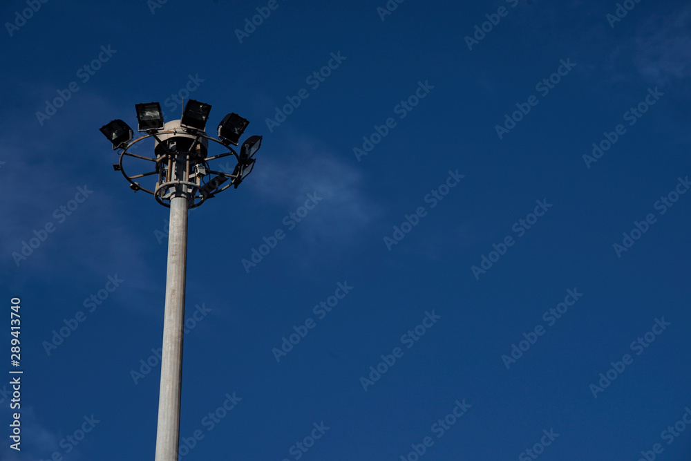 High way traffic light post with deep blue sky in background