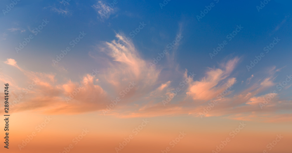Gentle sunrise sundown sky and colorful light clouds, panoramic