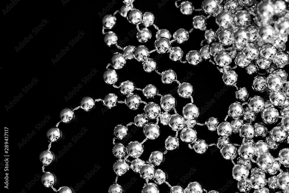Christmas decoration on a dark surface close up black and white. Abstract background