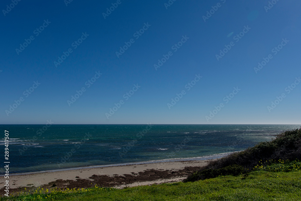 landscape with sea and blue sky view on beach from hills Australia 2019