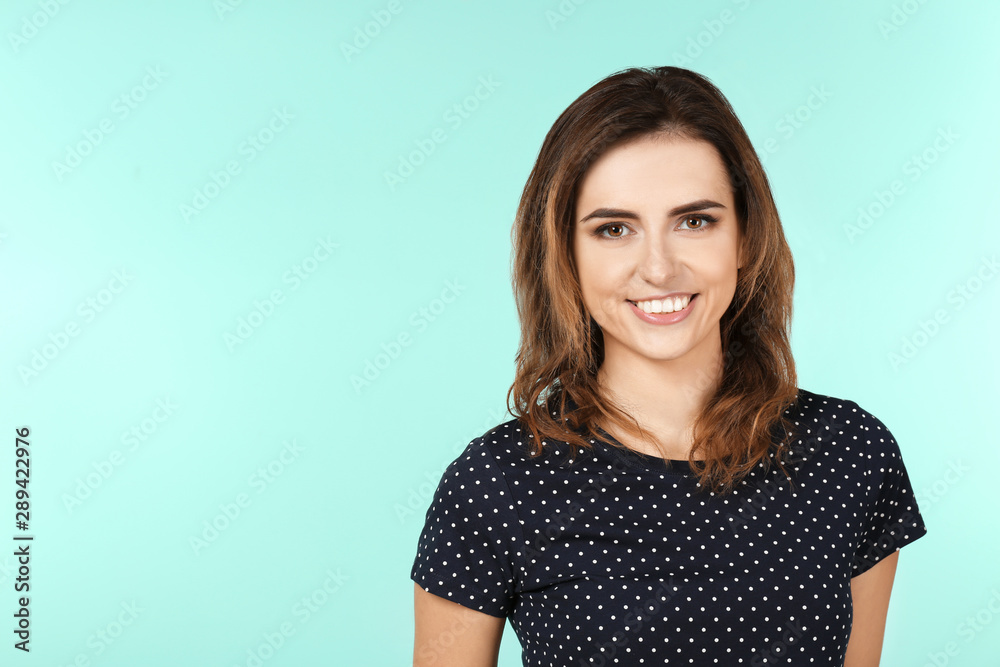 Smiling woman in casual clothes on color background Smiling woman in casual clothes on color background