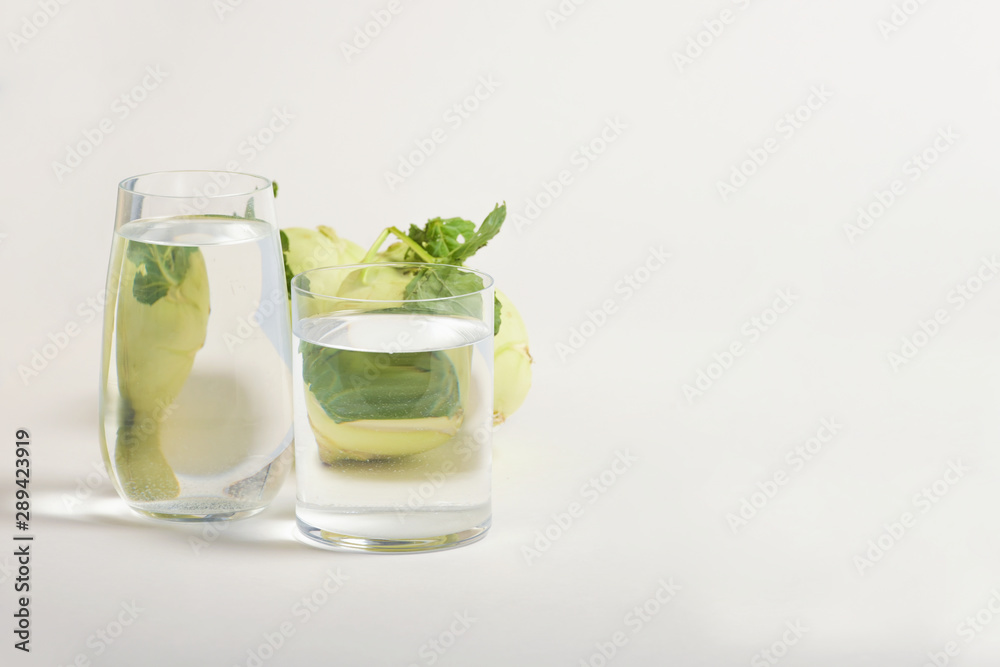 Foods distorted through liquid and glass on white background. Foods distorted through liquid and glass on white background.