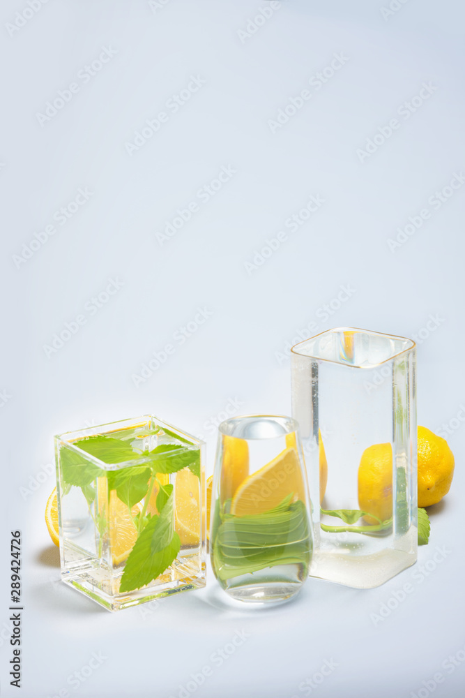 Foods distorted through liquid and glass on blue background. Foods distorted through liquid and glass on blue background.