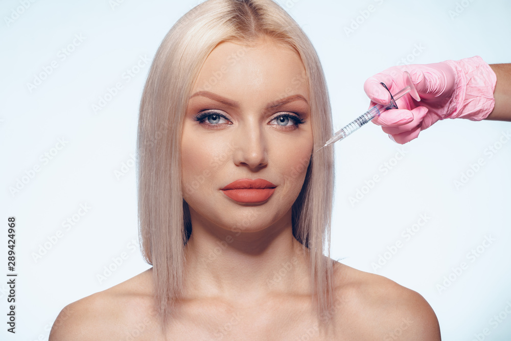 Portrait of young Caucasian woman. Concept of botox cosmetic injection