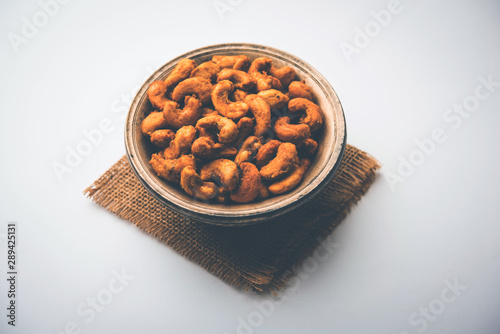 Kaju Pakoda/pakora OR Cashew Nut Fritters or bhajji, is a tasty snack from India, served as Chakna photo