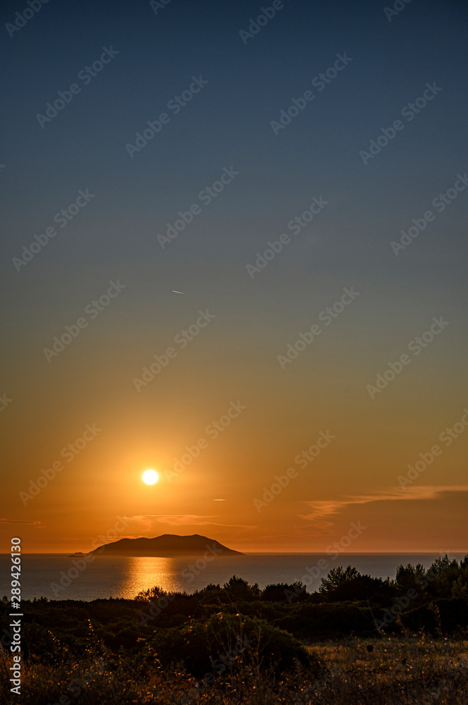 Sunset over a remote island Sunset over a remote island