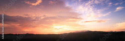 Dramatic sky and mountain sunrise background