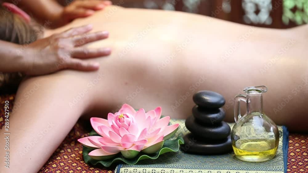 Thai massage alternative therapy medicine with Thai herb and aroma oil for spa or alternative medical concept Thai massage alternative therapy medicine with Thai herb and aroma oil for spa or alternative medical concept