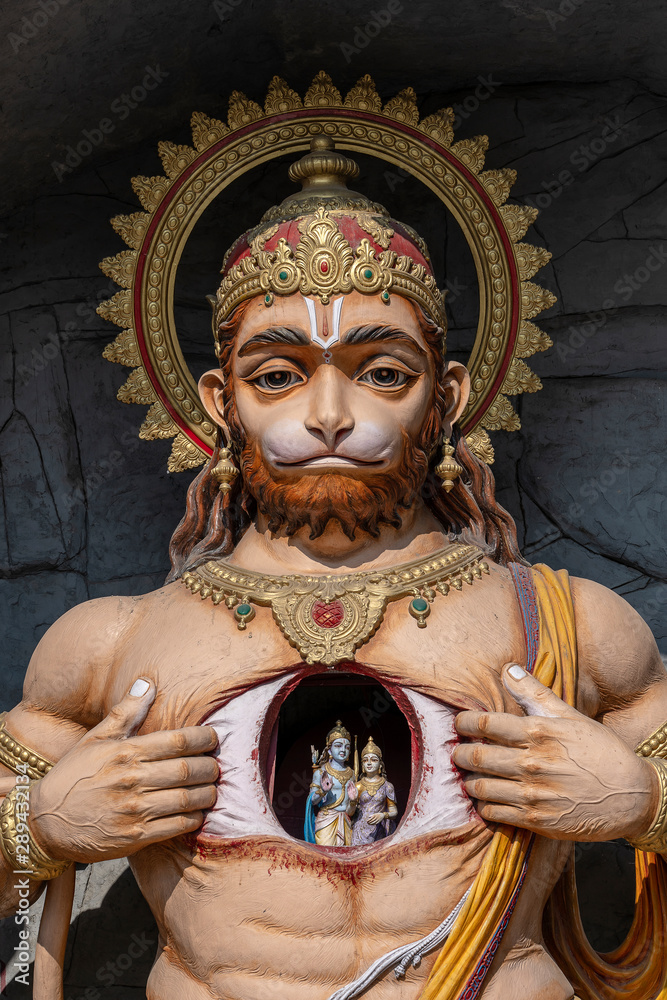 Hanuman statue, Hindu idol near Ganges River, Rishikesh, India. Sacred places for pilgrims
