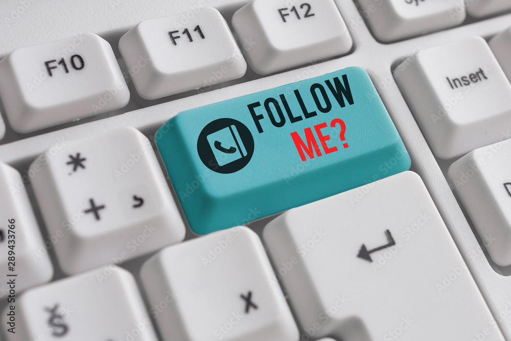 Writing note showing Follow Me Question. Business concept for go or come after demonstrating or thing proceeding ahead White pc keyboard with note paper above the white background Writing note showing Follow Me Question. Business concept for go or come after demonstrating or thing proceeding ahead White pc keyboard with note paper above the white background