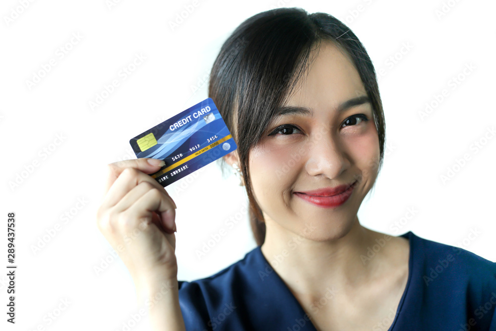 Portrait Asia smiling woman with credit card in hand,happy to have money concept. Portrait Asia smiling woman with credit card in hand,happy to have money concept.