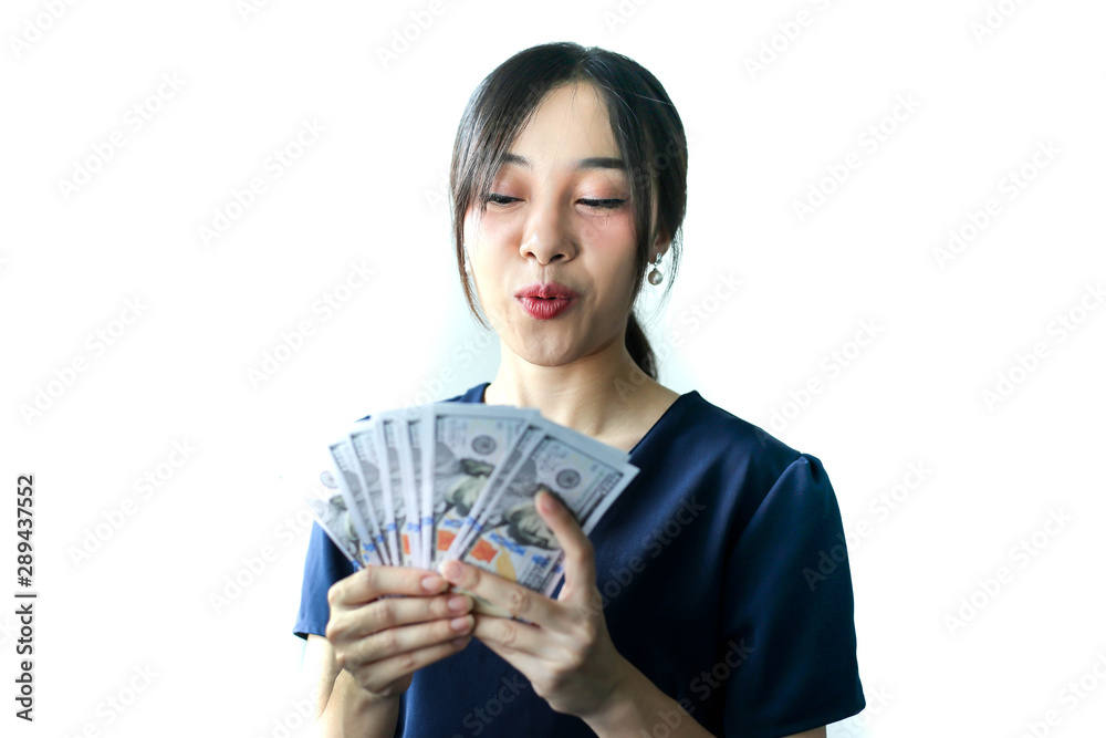 Portrait Asia smiling woman with dollars in hand,happy to have money concept. Portrait Asia smiling woman with dollars in hand,happy to have money concept.