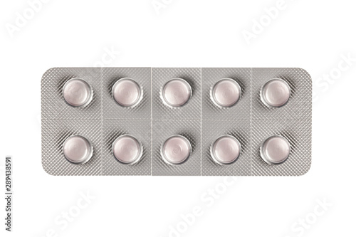 Pills in blister isolated on white background. Top view
