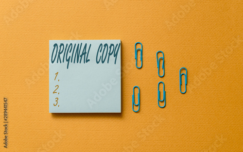 Writing note showing Original Copy. Business concept for Main Script Unprinted Branded Patented Master List Colored blank sticky note clips gathered trendy cool pastel background photo