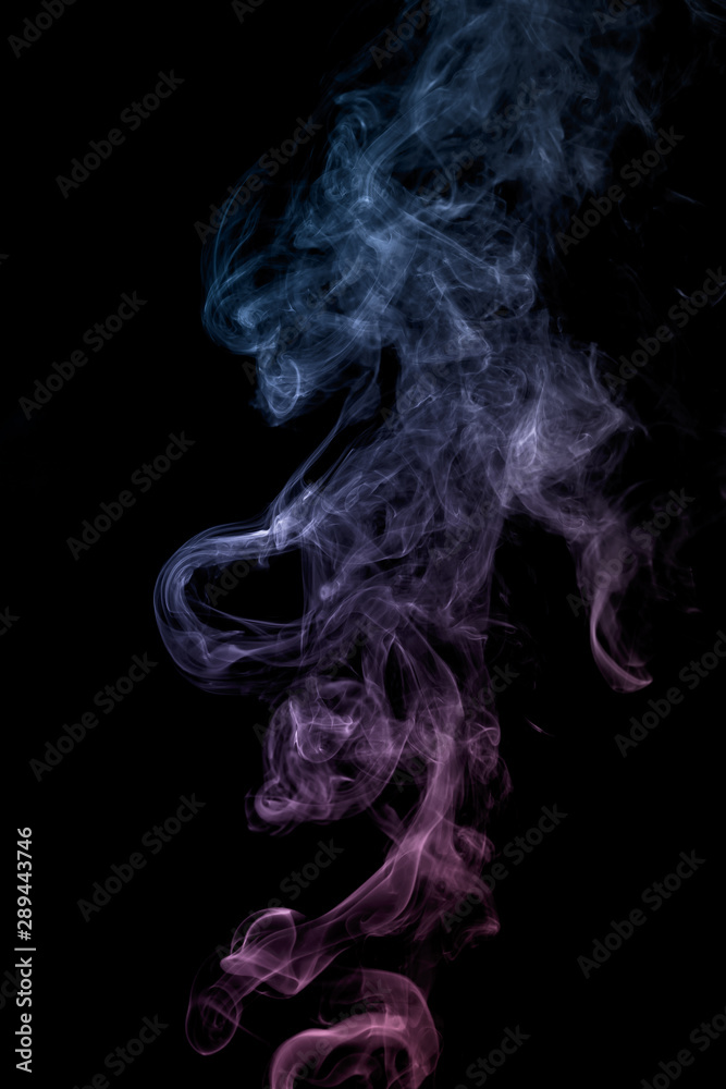 Colourful smoke on dark background