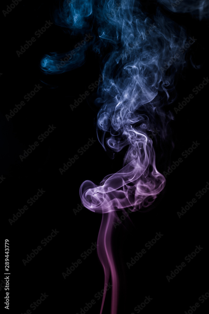 Colourful smoke on dark background Colourful smoke on dark background