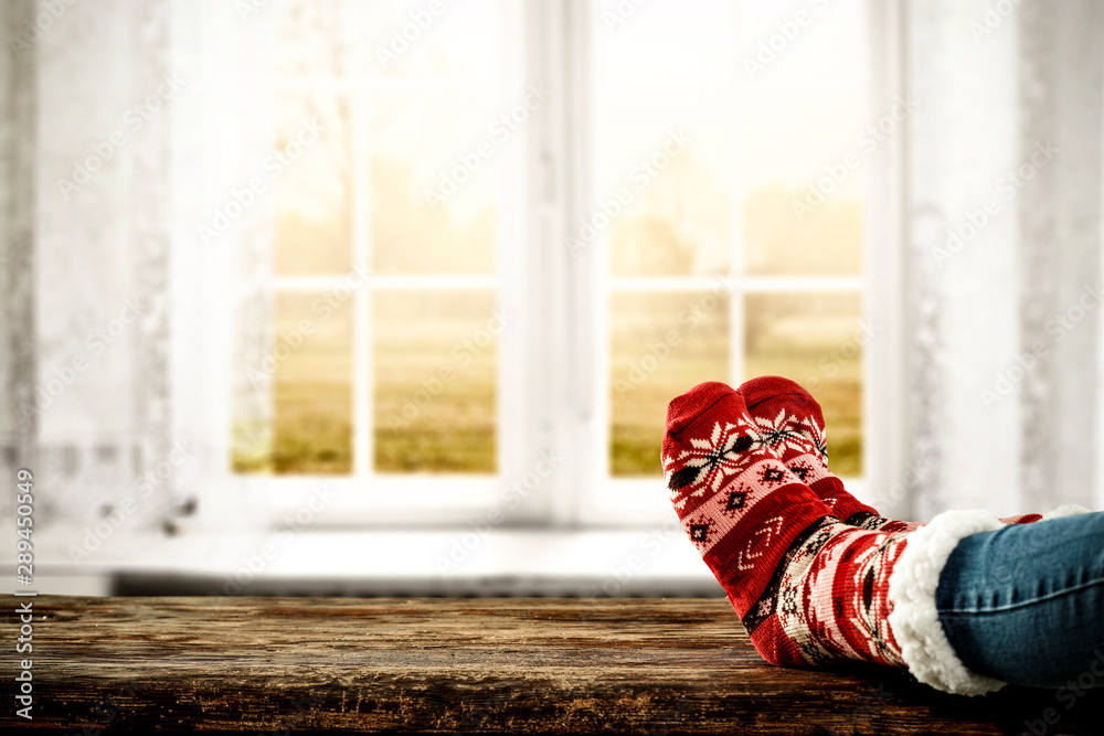 Fototapeta premium Woman legs with socks and autumn time 