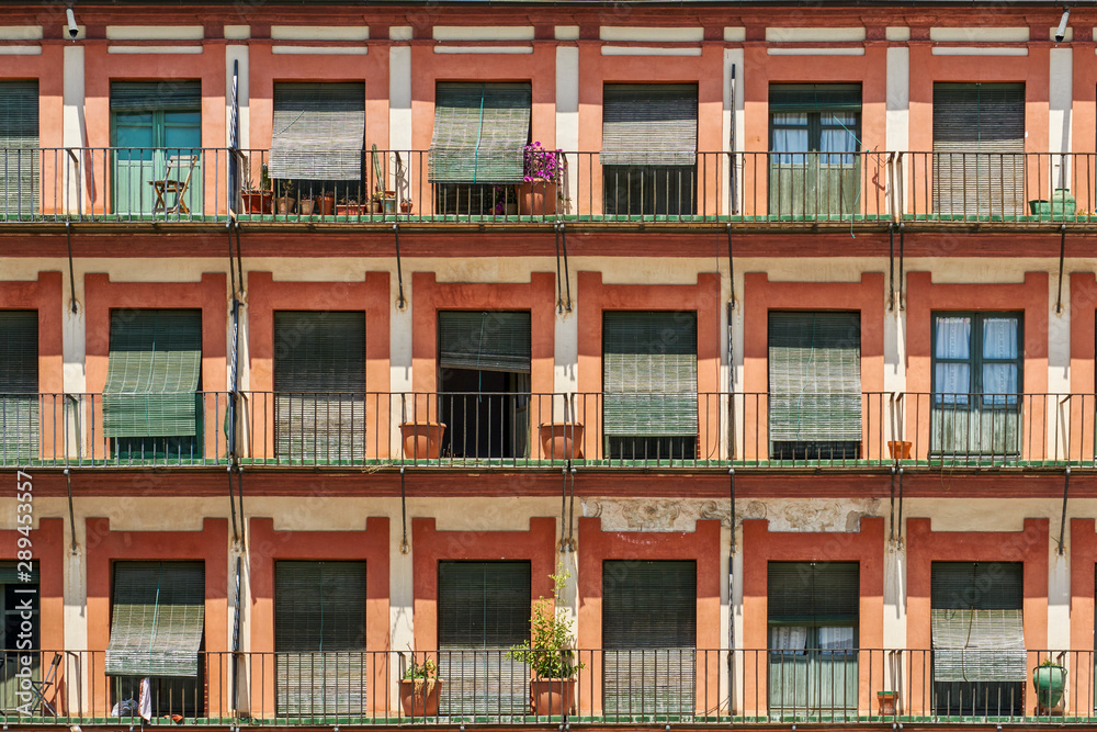 Balconies and windows Corredera square in Cordoba, Andalusia. Spain