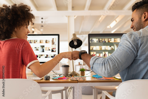 Young business creatives working together in an office