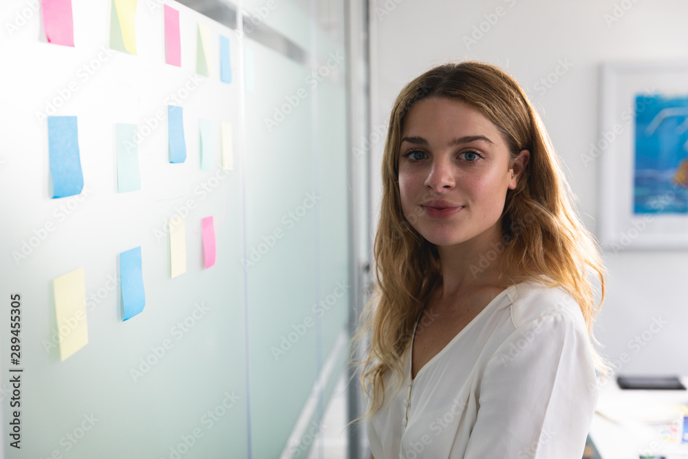 Portrait of young female creative working in a modern office Portrait of young female creative working in a modern office