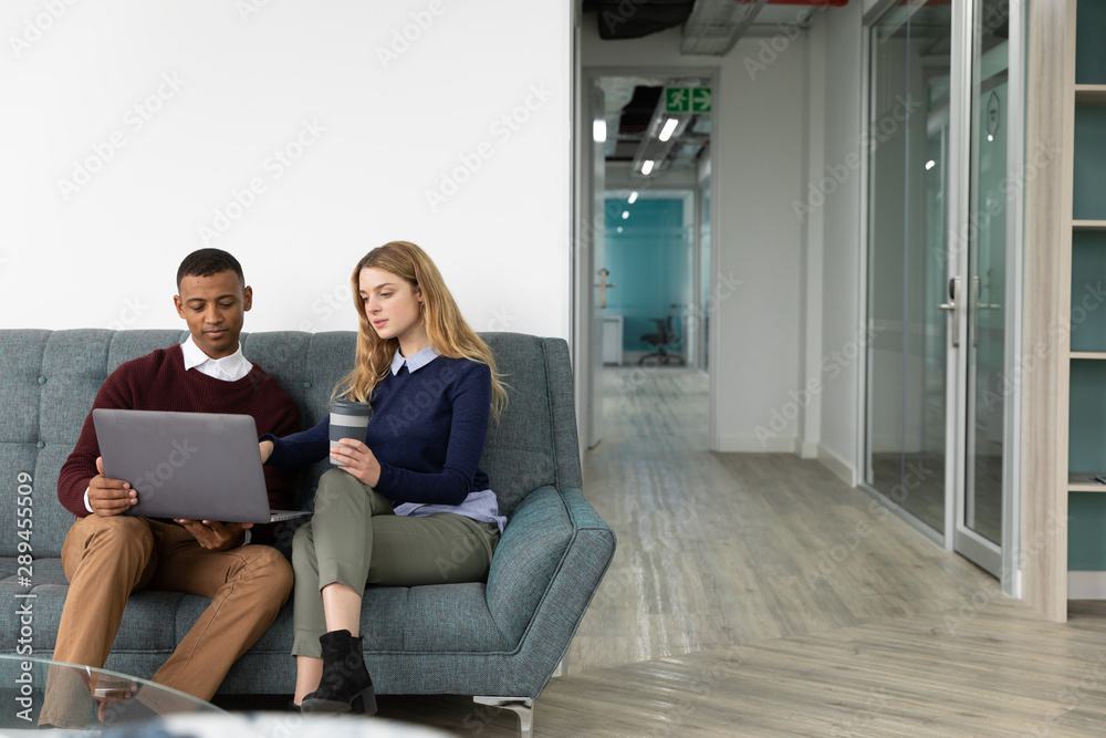 Young creatives working in a modern office Young creatives working in a modern office