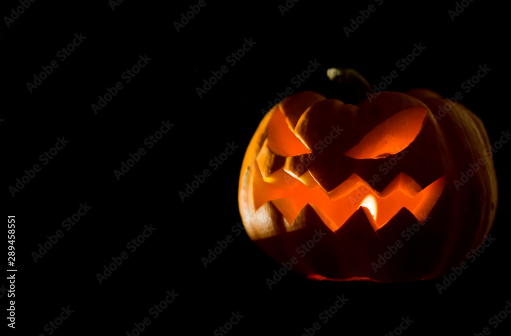 Jack o lantern Halloween on black background with copy space. Jack o lantern Halloween on black background with copy space.