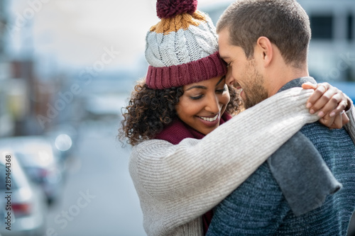 Konstfotografi Happy couple in love embracing in winter