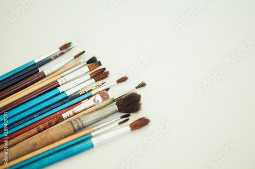 Set of paint brushes on the white background