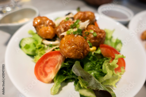 Fried chicken crispy on plate with salad