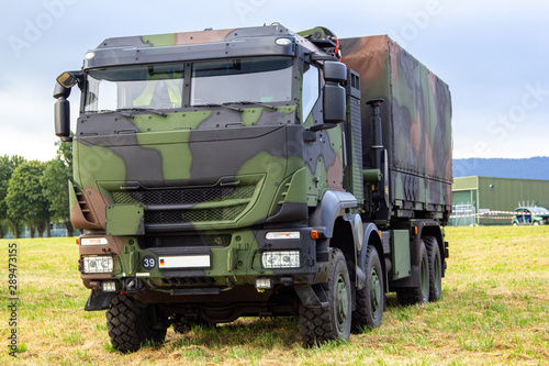 Military armored truck from german army stands on a field