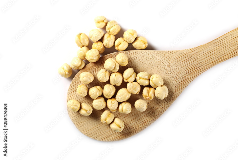 Chickpeas with wooden spoon isolated on white background, top view