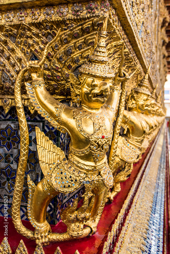 Ancient Garuda statue of the wall of Royal Grand Palace at Royal Grand Palace or wat pha kaew bangkok Thailand
