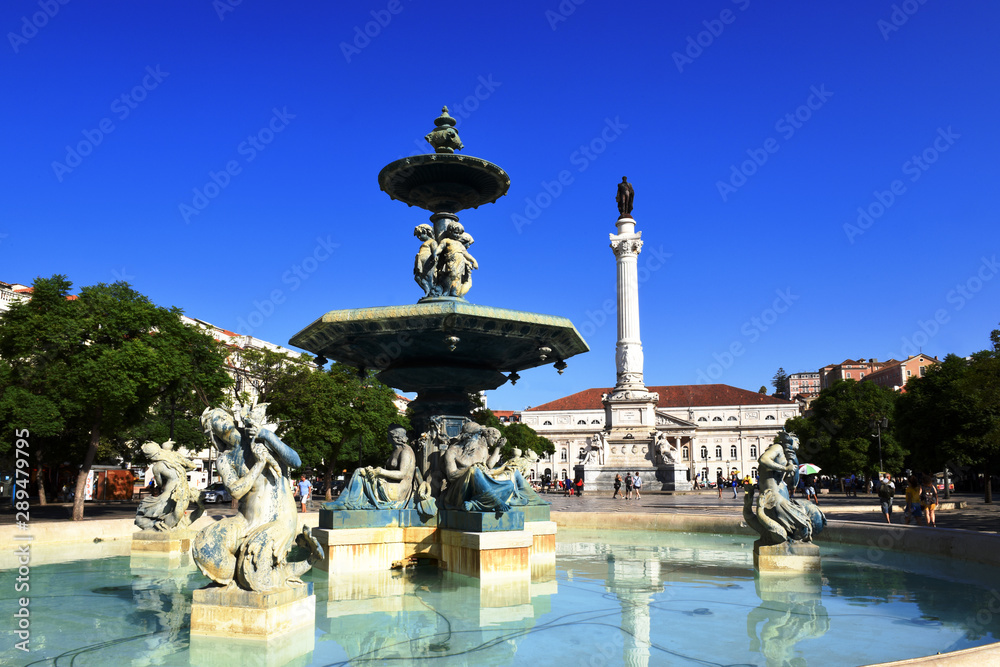 bronze fountains at Praca Dom Pedro IV, Rossio square in Lisbon, Portugal 