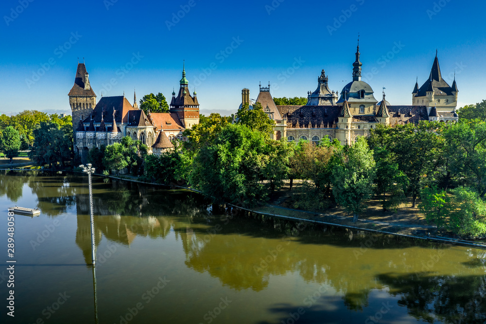 Vajdahunyad castle in Varosliget Budapest Hungary with reflection in the water