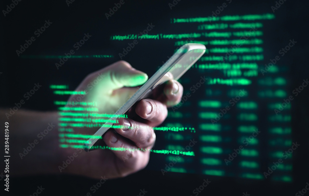 Darkweb, darknet and hacking concept. Hacker with cellphone. Man using dark  web with smartphone. Mobile phone fraud, online scam and cyber security  threat. Scammer using stolen cell. AR data code. Stock Photo