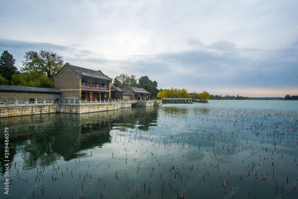 A beautiful day around the huge summer palace in the city of Beijing , its easy to get lost in the massive complex. 