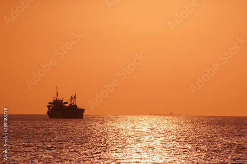 Ship silhouette and sunset © Photo_by_Tomo