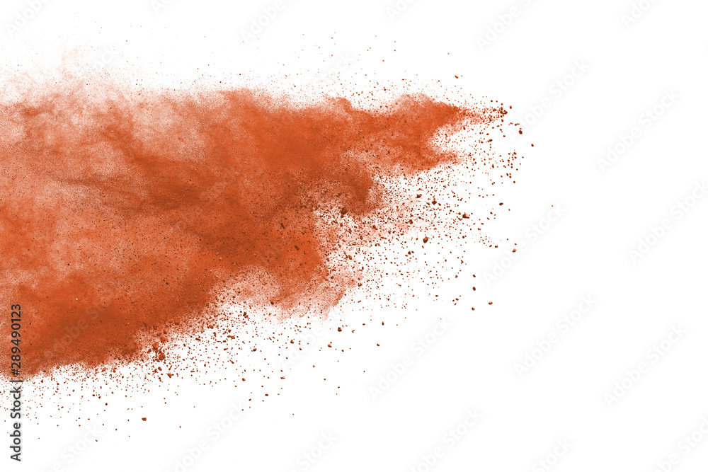 Brown powder explosion isolated on white background.