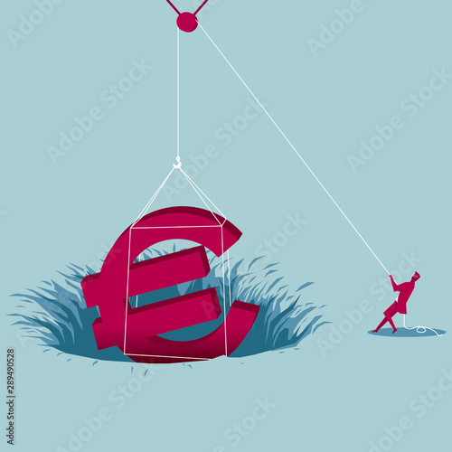 Businessman gets wealth from the trap. Isolated on blue background.