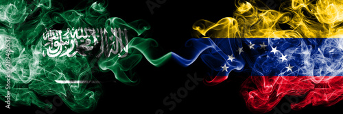 Saudi Arabia Kingdom vs Venezuela  Venezuelan smoky mystic flags placed side by side. Thick colored silky smoke flags of Arabic  Arabian and Venezuela  Venezuelan
