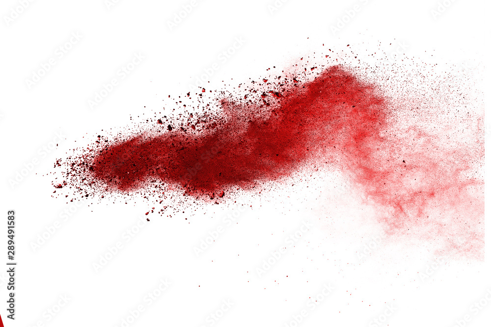 Red powder explosion on white background. 