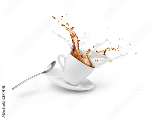 coffee and milk splash in white cup isolated