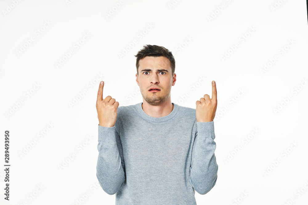 young man with arms raised young man with arms raised