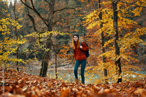 young woman in autumn park