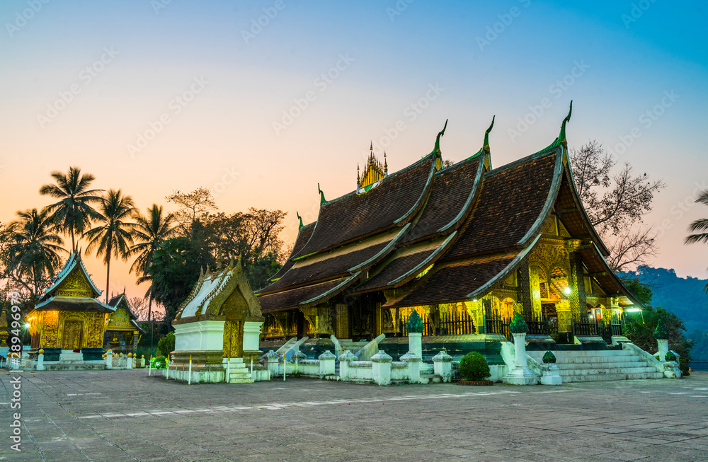 Wat Xieng Thong temple(Temple of the Golden City),Luang Prabang, Laos with twilight sky background