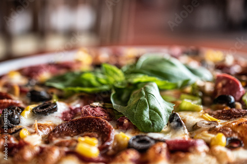 Italian pizza close up , ideal for restaurant web site, restaurant ads, italian restaurant banners photo