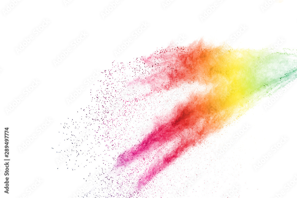 Freeze motion of colorful color powder exploding on white background.  Paint Holi.