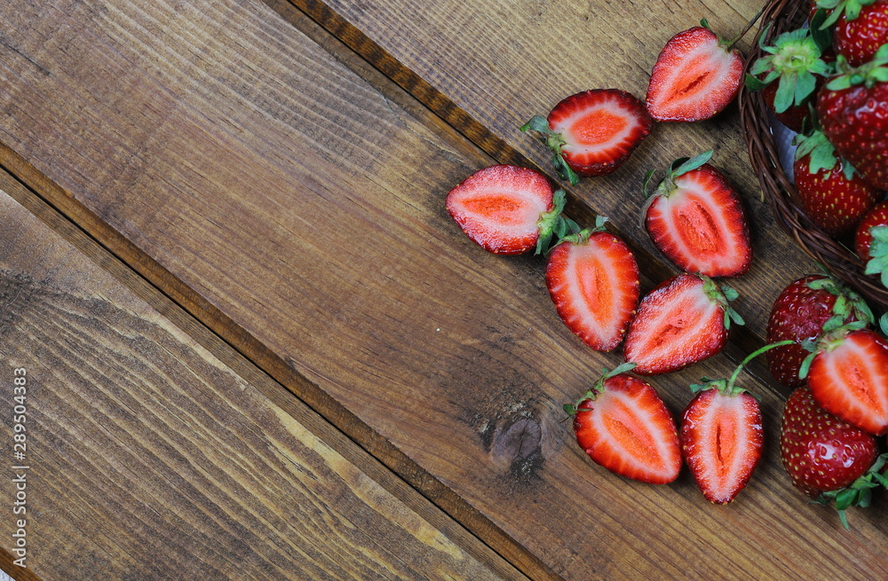 strawberries in bulk on wooden board