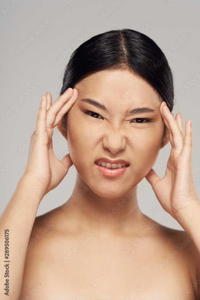 young woman with headache