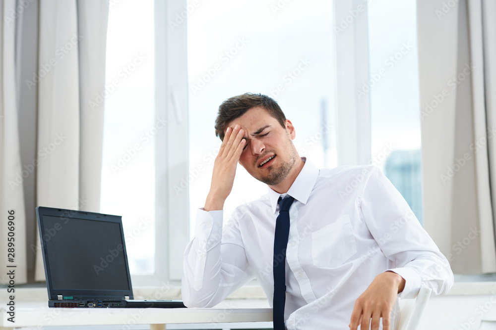 businessman talking on phone in office businessman talking on phone in office